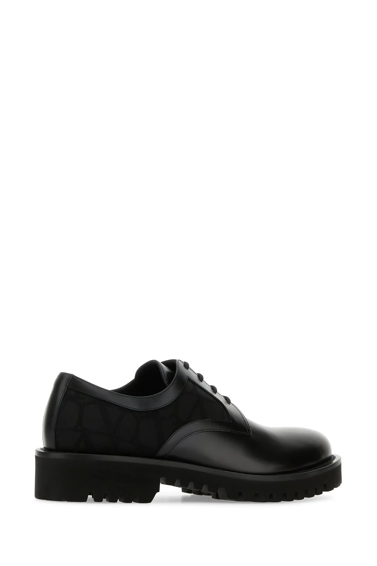 Black leather and Tolie Iconographe lace-up shoes